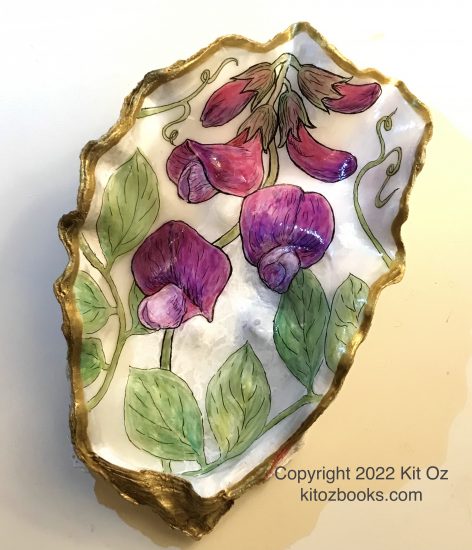 Bea pea flowers on an oyster shell