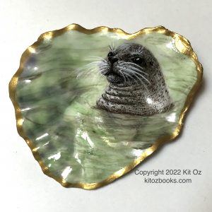 harbor seal painted on an oyster shell