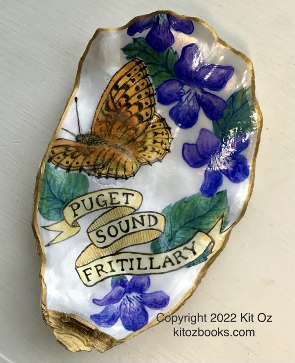 fritillary butterfly and violets, on an oyster shell