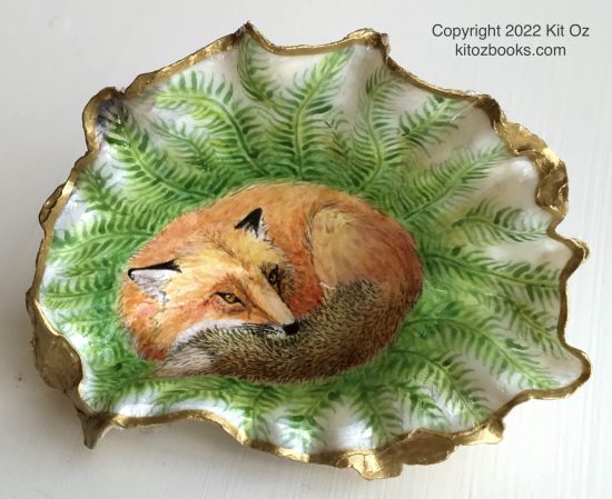 red fox curled up in a sword fern bower by Kit Oz