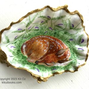 fawn curled asleep in a patch of vetch, painted inside an oyster shell with gold trim